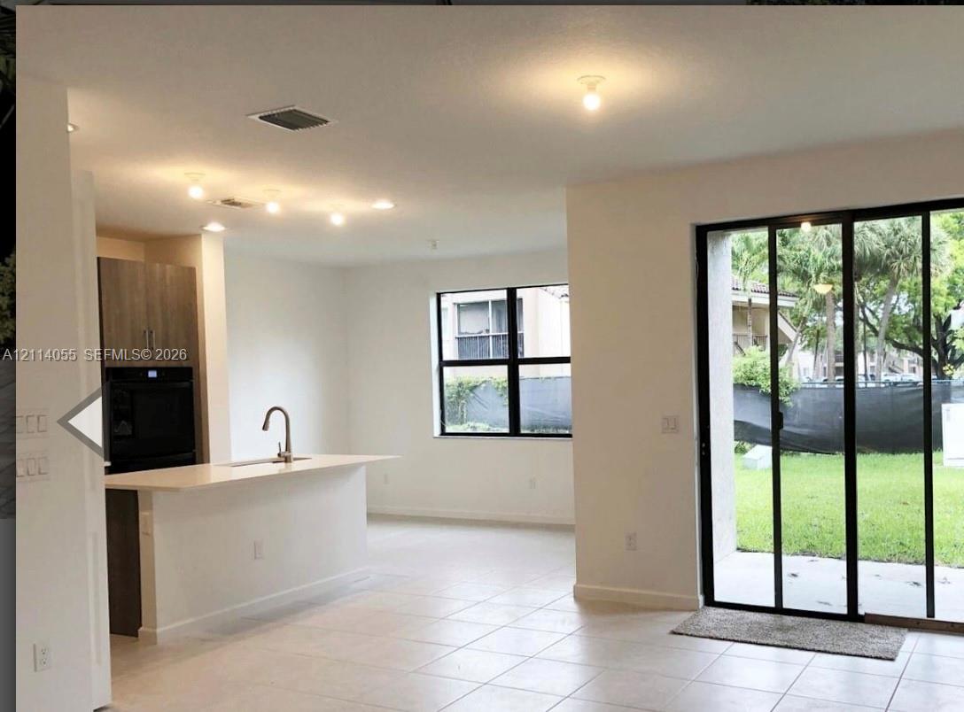 Kitchen island with quartz countertop and undermou