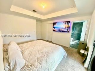 Tray ceiling, neutral carpeting, and solid-core in